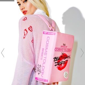 Doll’s Kill Versatile Pink Dropout Bag